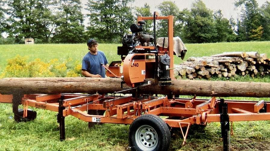 Jerry Ball operating a Wood-Mizer portable sawmill in Canada