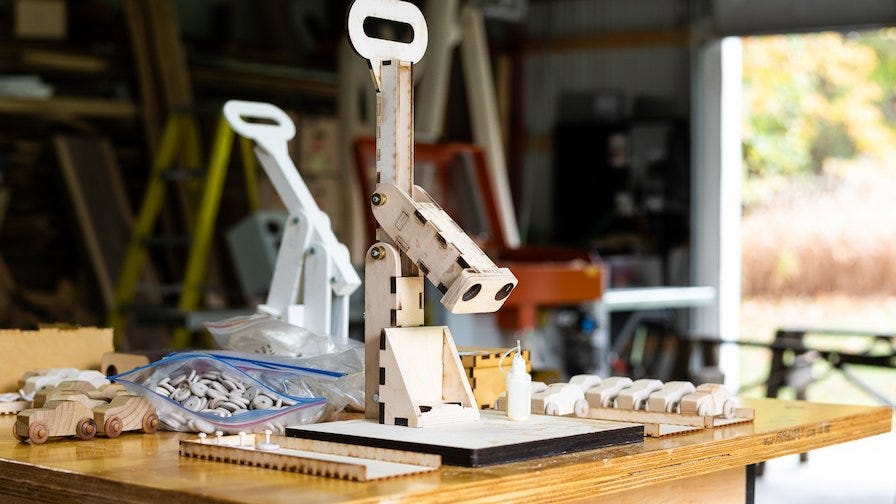 Custom-built wheel jig for assembling wooden cars