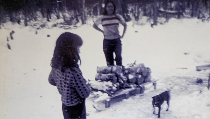 Vickie Knapp in Alaska with firewood