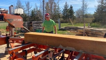 Gary Phillips with Wood-Mizer portable sawmill in Nova Scotia